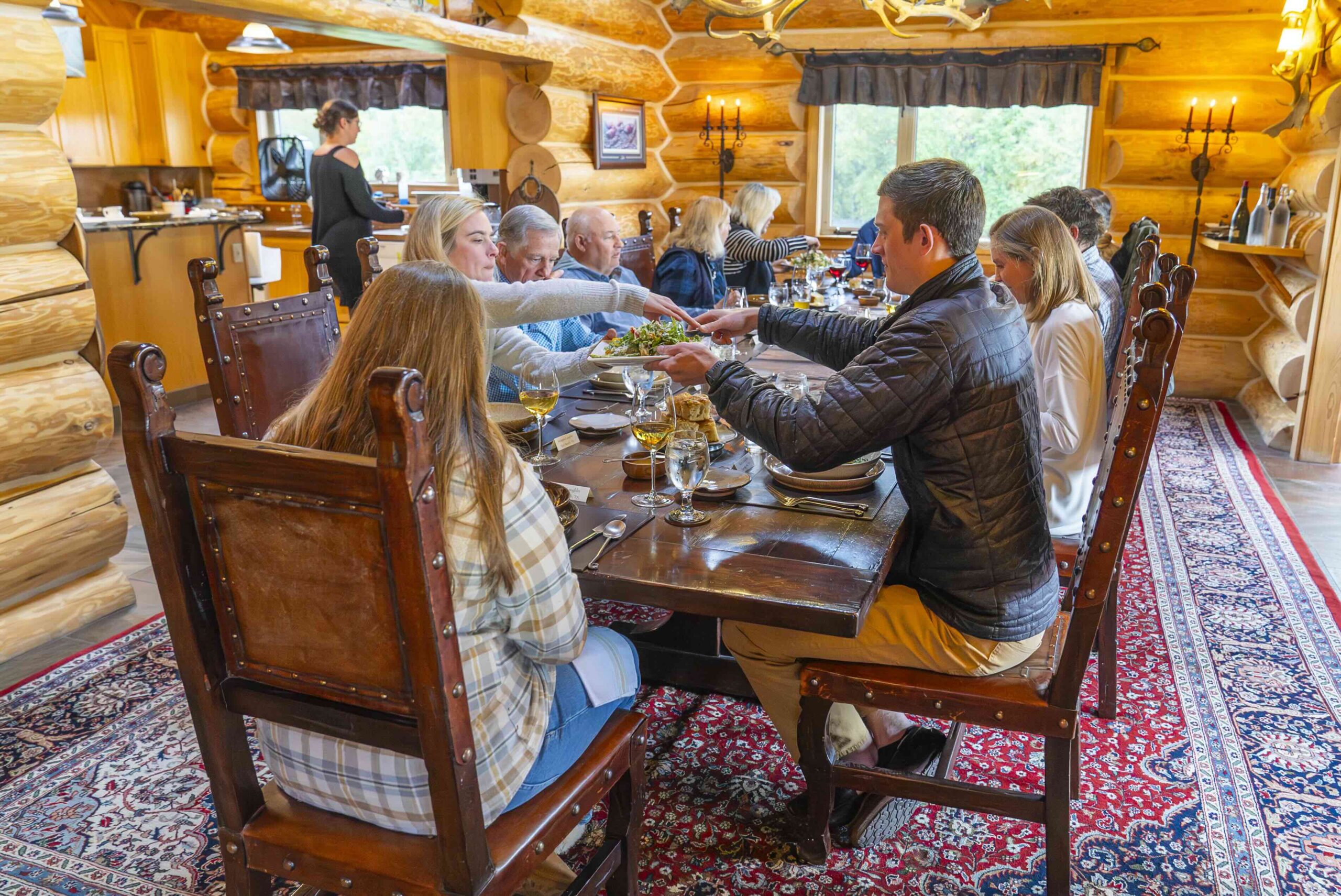 Guests at the dining table at the lodge