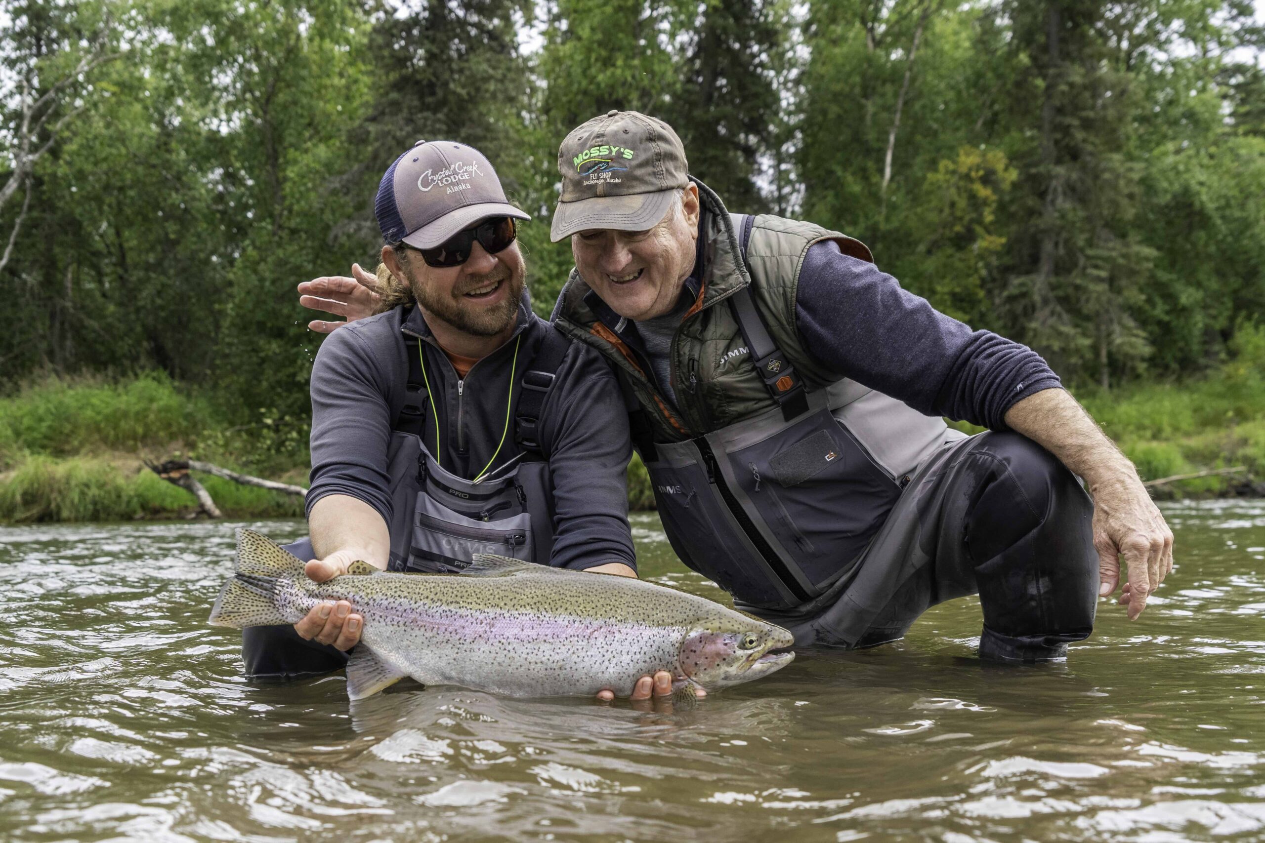 Holding a rainbow trout